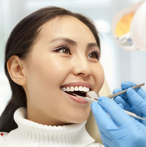 woman smiling at dentist